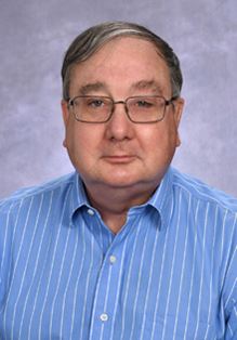 John E. Lane, MD