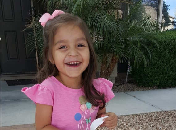 Smiling girl wearing pink