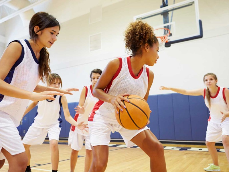 Girls playing basketball